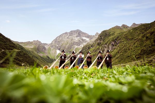 Alphorn blowers in the Stubaital valley, Tyrol